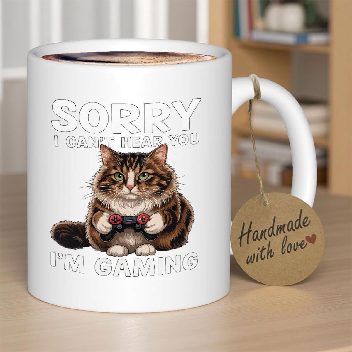 Tailorly White Ceramic 11 oz Mug - Sorry I Cant Hear You Im Gaming Adorable Fluffy Brown Tabby Cat Holding A Black Game Controller Cat