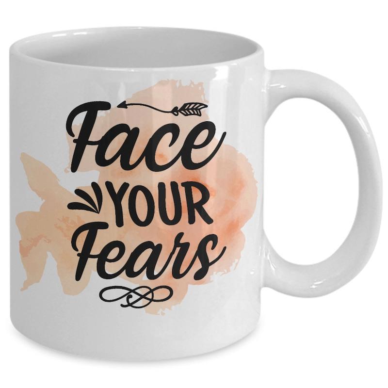 Tailorly White Ceramic 11 oz Mug - Face Your Fears Soft Peach Watercolor Flower Behind Inspirational Quote With Small Arrow Accents Mug