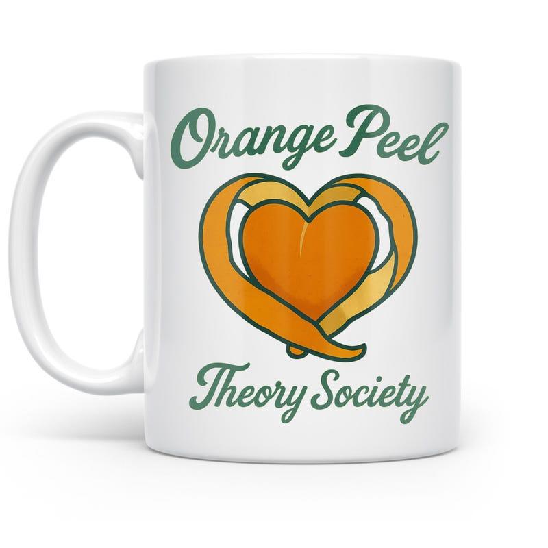 Tailorly White Ceramic 11 oz Mug - Orange Peel Theory Society Stylized Heart Shape Formed By Peeled Vibrant Citrus Fruit Orange