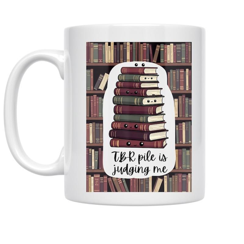Tailorly White Ceramic 11 oz Mug - TBR Pile Is Judging Me Tall Stack Of Vintage Hardcover Volumes Resting Before A Library Shelf Bookshelf