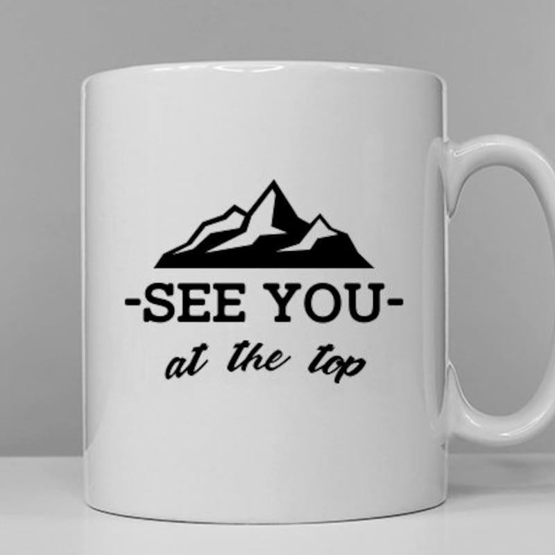 Tailorly White Ceramic 11 oz Mug - See You At The Top Rugged Silhouette Of A Majestic Mountain Peak Standing Tall Against The Horizon Mountain