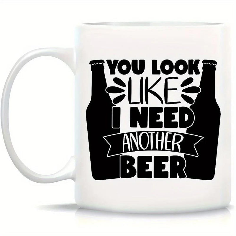 Tailorly White Ceramic 11 oz Mug - You Look Like I Need Another Beer Symmetrical Silhouettes Of Bottles With Decorative Rays And Styled Text Beer