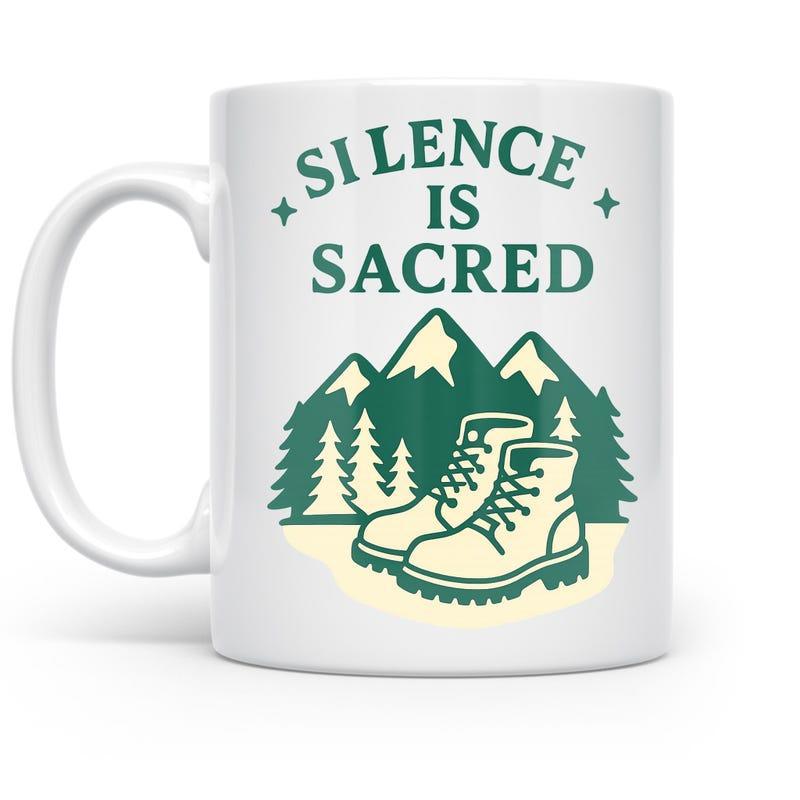 Tailorly White Ceramic 11 oz Mug - Silence Is Sacred Outdoor Wilderness Scene Among High Peaks And Evergreen Trees Hiking Boots
