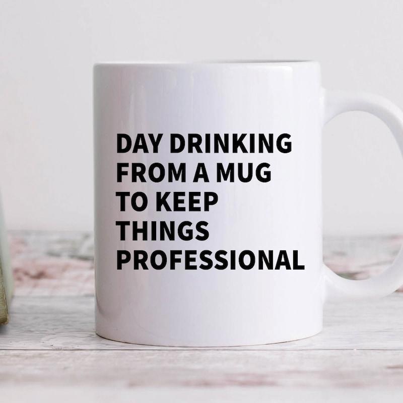 Tailorly White Ceramic 11 oz Mug - Day Drinking From A Mug To Keep Things Professional Minimalist White Ceramic Vessel Resting On A Rustic Wooden Table Surface Mug