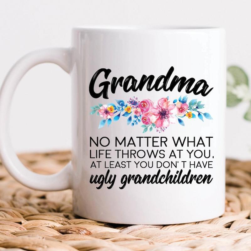 Tailorly White Ceramic 11 oz Mug - Grandma No Matter What Life Throws At You At Least You Dont Have Ugly Grandchildren Watercolor Painted Pink And Blue Blooming