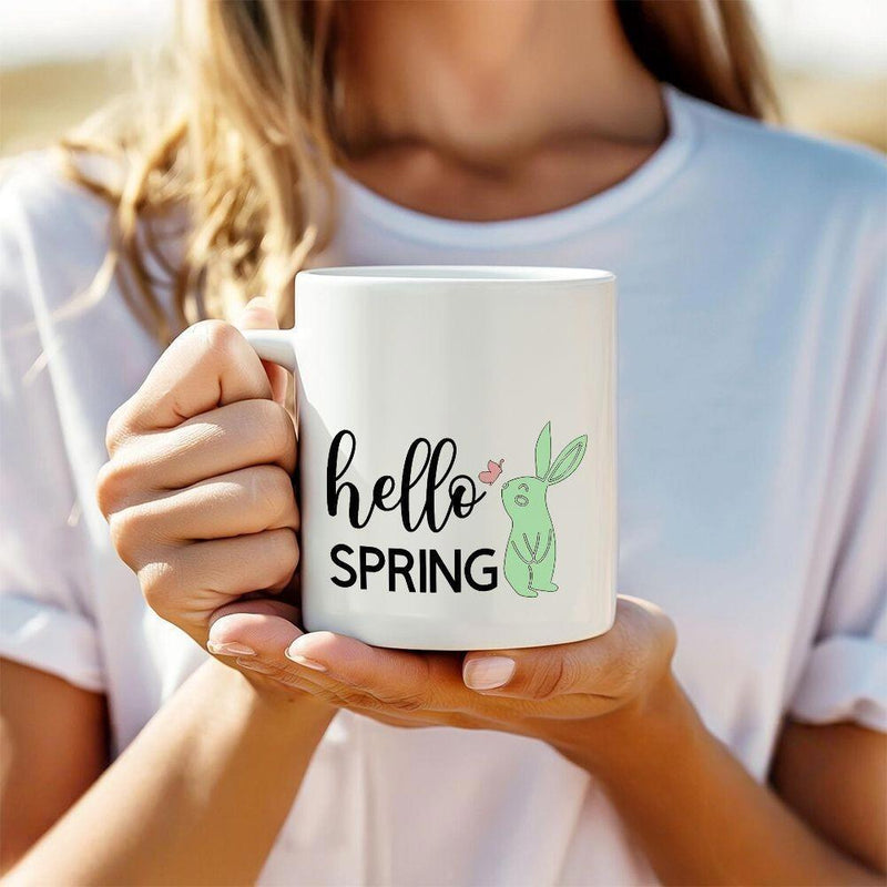 Tailorly White Ceramic 11 oz Mug - Hello Spring Simple Green Minimalist Silhouette With Small Pink Heart Accent Rabbit