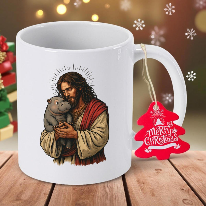 Tailorly White Ceramic 11 oz Mug - Merry Christmas Sacred Figure Wearing Robes Holding A Cute Tiny Baby Hippo
