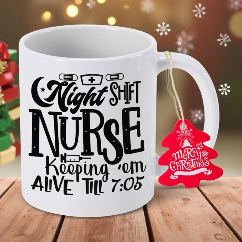 Tailorly White Ceramic 11 oz Mug - Night Shift Nurse Keeping Em Alive Till 705 Bold Typography With Medical Icons On A Clean White Surface Mug