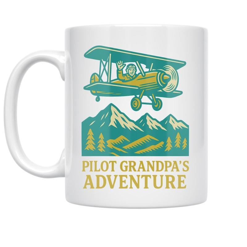Tailorly White Ceramic 11 oz Mug - Pilot Grandpas Adventure Vintage Yellow Biplane Soaring Above Majestic Snowy Green Mountains Biplane