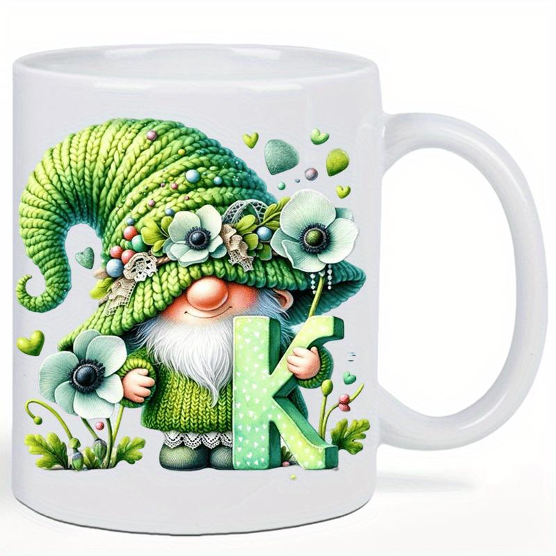 Tailorly White Ceramic 11 oz Mug - K Whimsical Green Knitted Hat Garden Gnome Amidst Blooming Summer Flowers Gnome