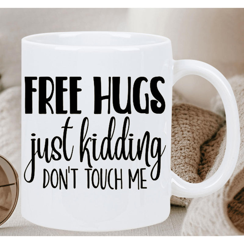 Tailorly White Ceramic 11 oz Mug - Free Hugs Just Kidding Don't Touch Me Bold Black Typography With Elegant Cursive Script Centered On Minimalist