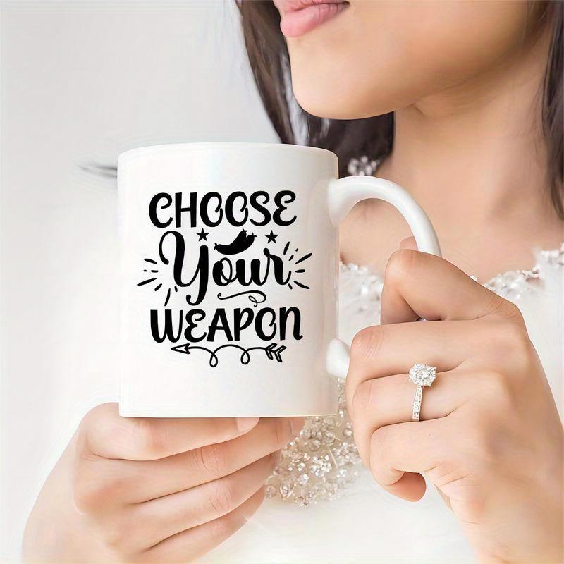 Tailorly White Ceramic 11 oz Mug - Choose Your Weapon Bold Script Lettering With Artistic Flourishes And Decorative Star Elements Typography