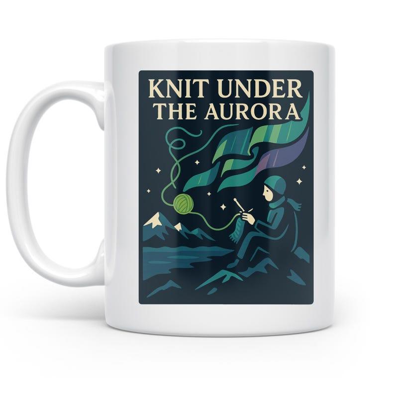 Tailorly White Ceramic 11 oz Mug - Knit Under The Aurora Serene Figure Knitting On Mountains Under Vibrant Green Glowing Night Sky