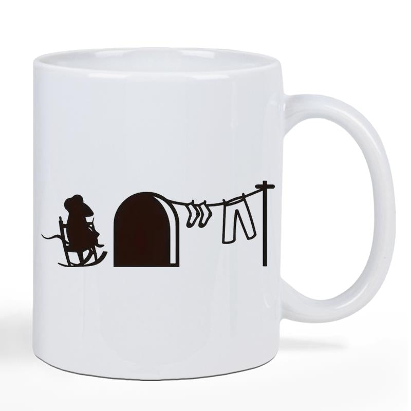 Tailorly White Ceramic 11 oz Mug - Small Silhouette Sitting In Rocking Chair Beside A Cozy Dark Hole Mouse