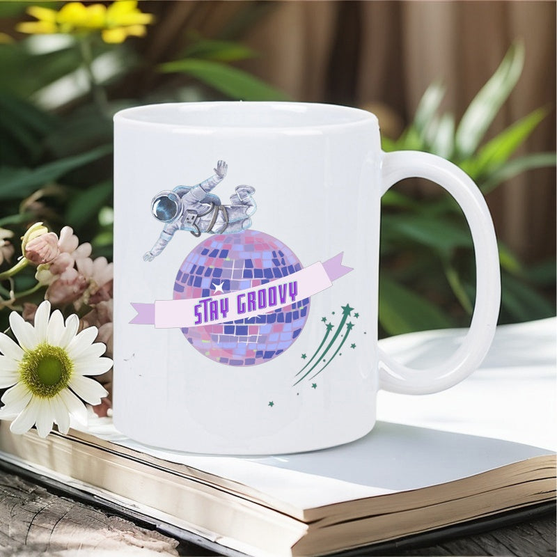 Tailorly White Ceramic 11 oz Mug - Stay Groovy Floating Astronaut Hovering Over Shining Purple Disco Ball Among Shooting Stars Astronaut