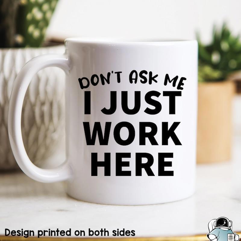 Tailorly White Ceramic 11 oz Mug - Don't Ask Me I Just Work Here Minimalist White Ceramic Vessel Featuring Bold Black Sans Serif Lettering Mug