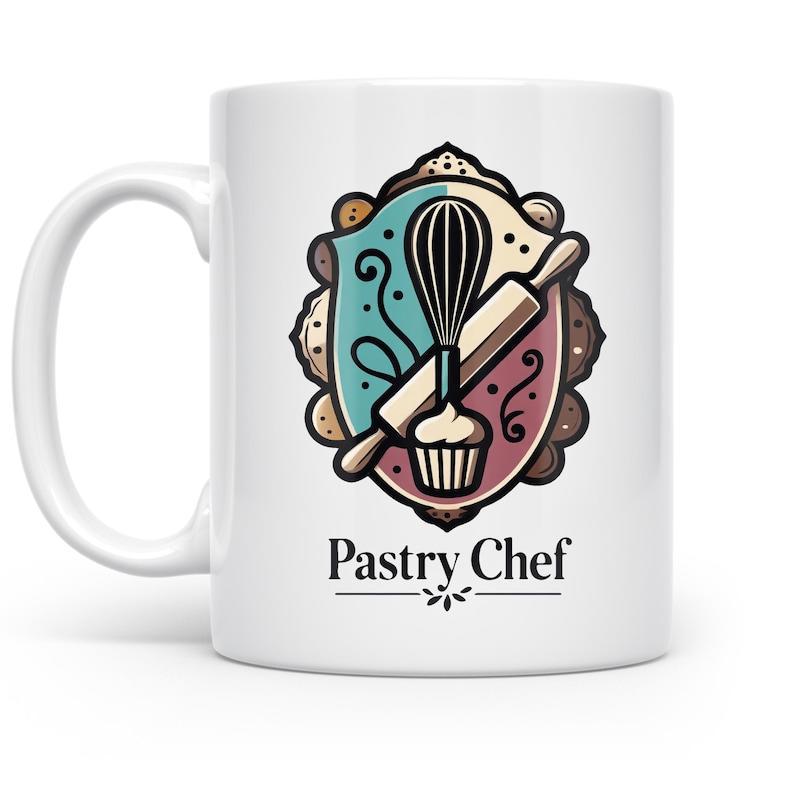 Tailorly White Ceramic 11 oz Mug - Pastry Chef Kitchen Baking Tools Inside A Decorative Vintage Style Shield Emblem Cupcake