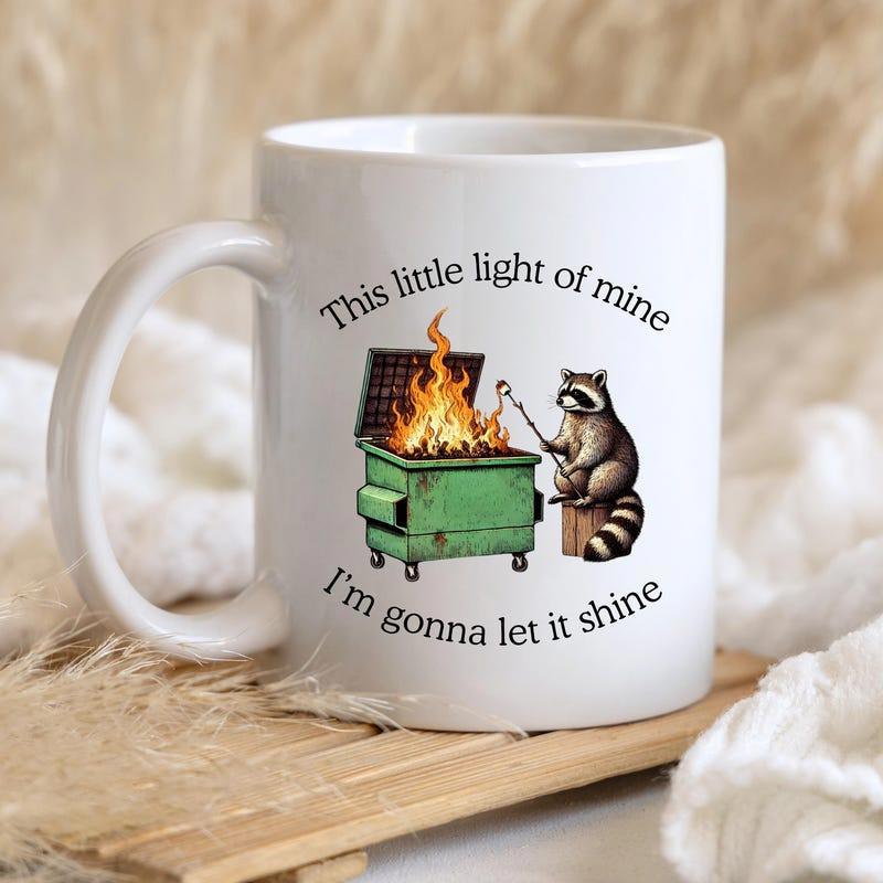 Tailorly White Ceramic 11 oz Mug - This Little Light Of Mine Im Gonna Let It Shine Whimsical Raccoon Roasting Marshmallows Over A Blazing Green Trash Container