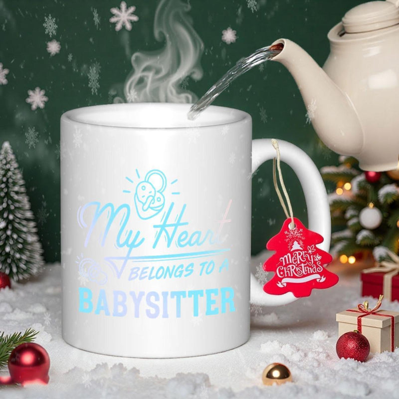 Tailorly White Ceramic 11 oz Mug - My Heart Belongs To Babysitter Elegant White Porcelain Surface Featuring Stylized Caregiver Icon Within Winter Scene Mug