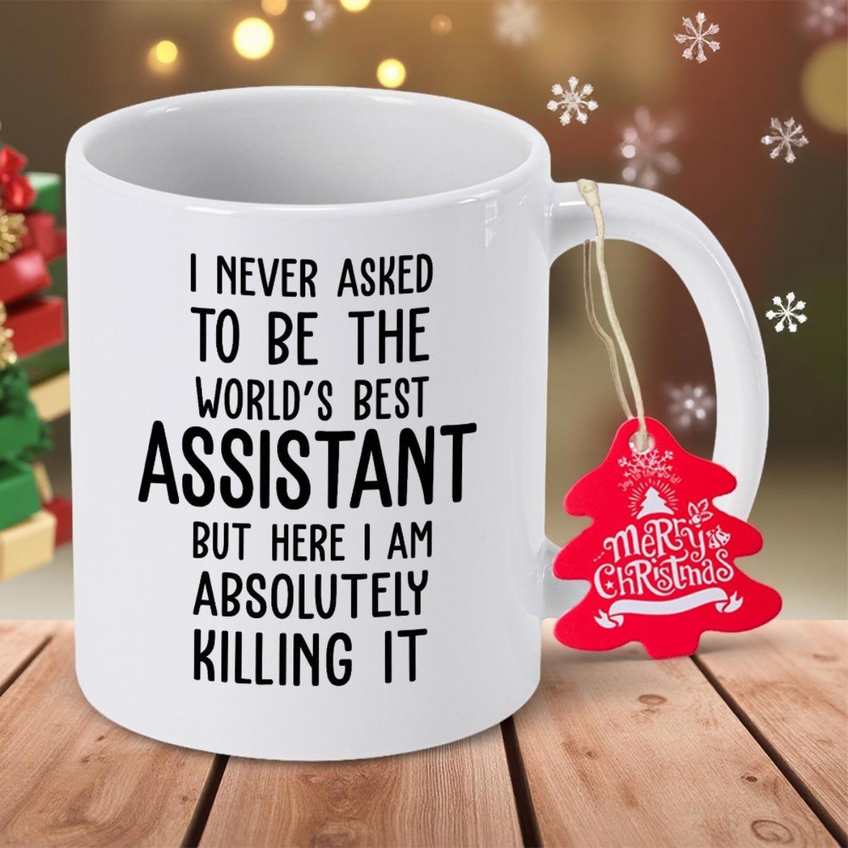 Tailorly White Ceramic 11 oz Mug - I Never Asked To Be The World's Best Assistant But Here I Am Absolutely Killing It Elegant Resting Upon Rustic Wooden Texture