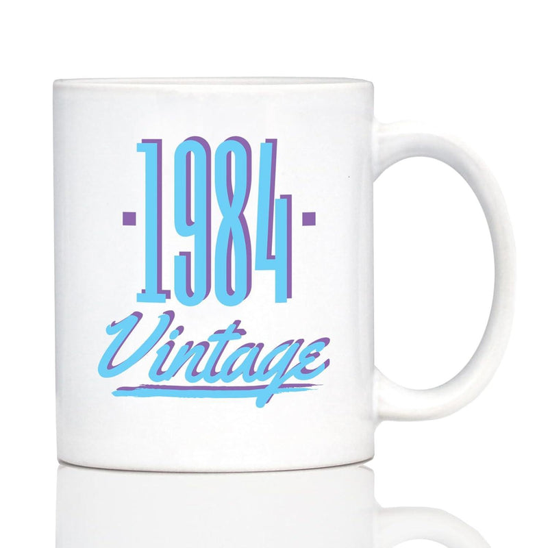 Tailorly White Ceramic 11 oz Mug - 1984 Vintage Retro Blue And Purple Three Dimensional Tall Block Numbers With Cursive Script Sign