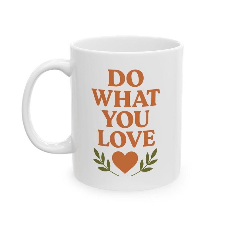 Tailorly White Ceramic 11 oz Mug - Do What You Love Warm Orange Heart Centered Between Two Small Green Branch Leaf Designs Mug