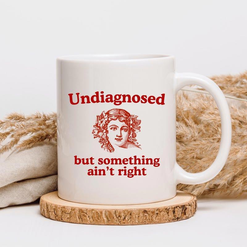 Tailorly White Ceramic 11 oz Mug - Undiagnosed But Something Aint Right Vintage Red Illustration Featuring A Classic Woman With Ornate Hair Details Portrait