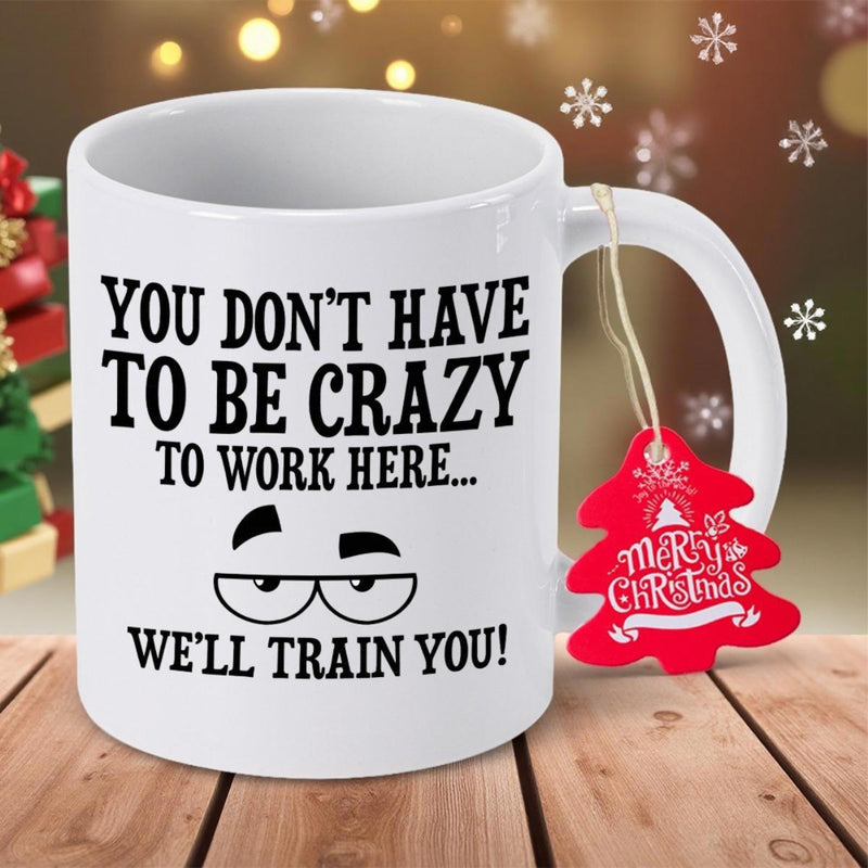 Tailorly White Ceramic 11 oz Mug - You Don't Have To Be Crazy To Work Here We'll Train You Minimalist Sketch Of Tired Eyes With Thick Brows Humor Mug