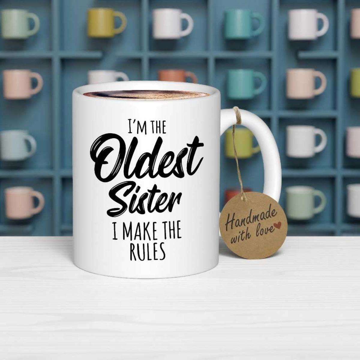 Tailorly White Ceramic 11 oz Mug - Im The Oldest Sister I Make The Rules Clean Featuring Bold Black Script Typography Against Blurred Background Mug