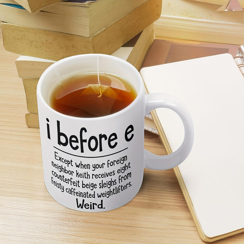 Tailorly White Ceramic 11 oz Mug - I Before E Weird Simple White Ceramic Vessel Filled With Hot Steaming Brown Tea Mug