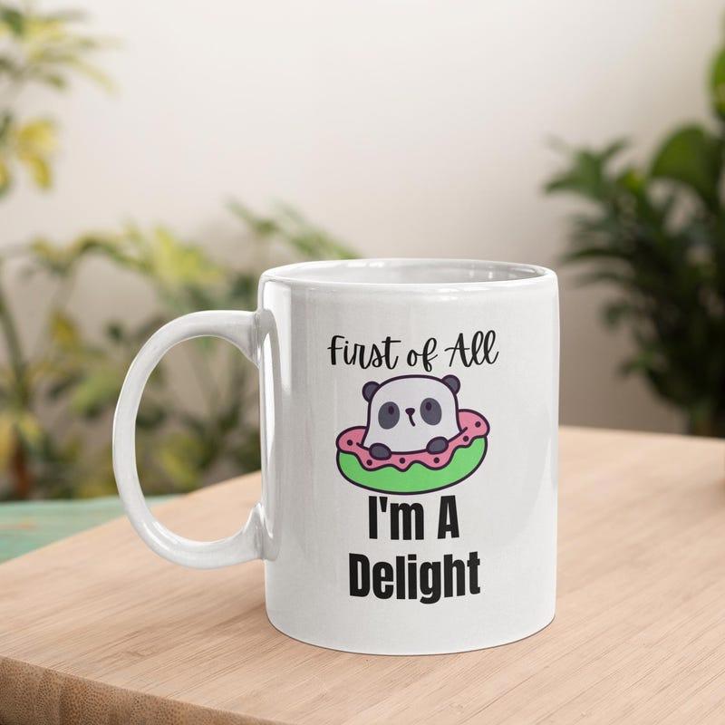 Tailorly White Ceramic 11 oz Mug - First Of All I'm A Delight Cute Cartoon Panda Resting Inside A Sweet Colorful Frosted Donut Panda