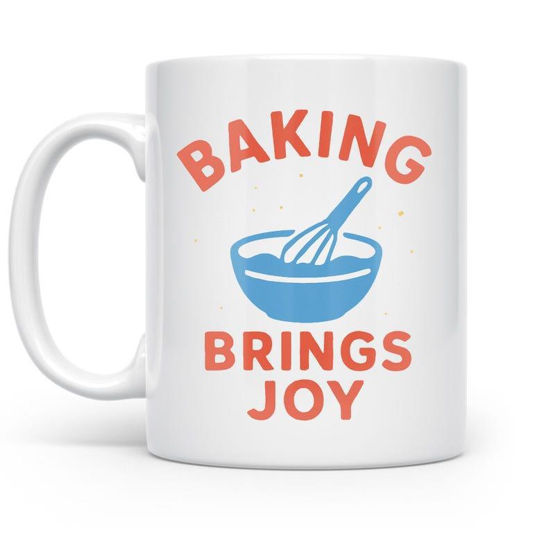 Tailorly White Ceramic 11 oz Mug - Baking Brings Joy Simple Blue Mixing Bowl With Handheld Whisk Floating In Center Bowl