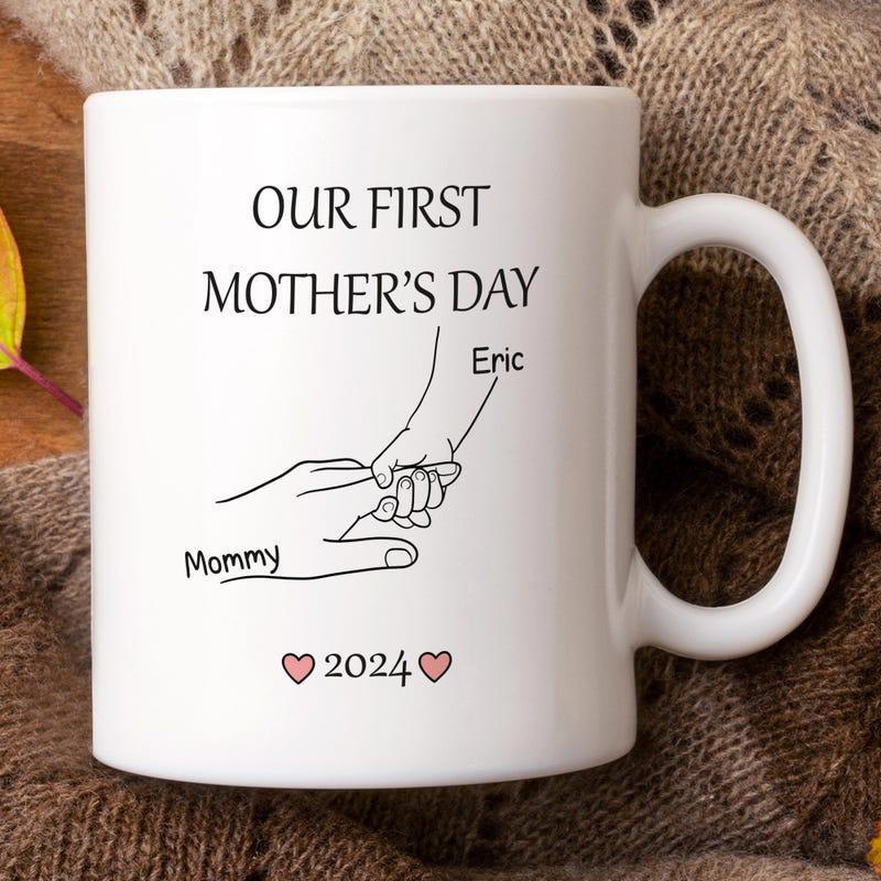 Tailorly White Ceramic 11 oz Mug - Our First Mothers Day Mommy Eric 2024 Minimalist Line Art Drawing Of Parent And Baby Holding Pinkies Mug