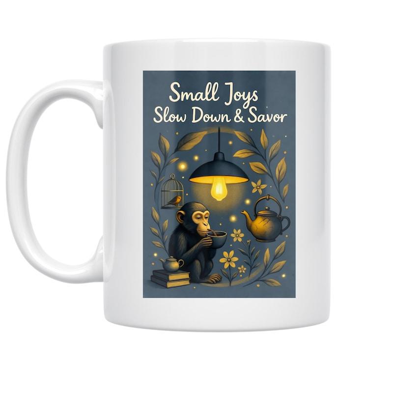 Tailorly White Ceramic 11 oz Mug - Small Joys Slow Down Savor Peaceful Chimpanzee Sitting On Books Drinking Tea Under A Glowing Lamp Monkey