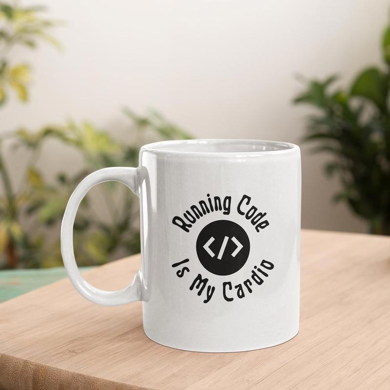 Tailorly White Ceramic 11 oz Mug - Running Code Is My Cardio Sleek Circular Emblem Displaying Programming Tag Syntax Surrounded By Bold Lettering Code
