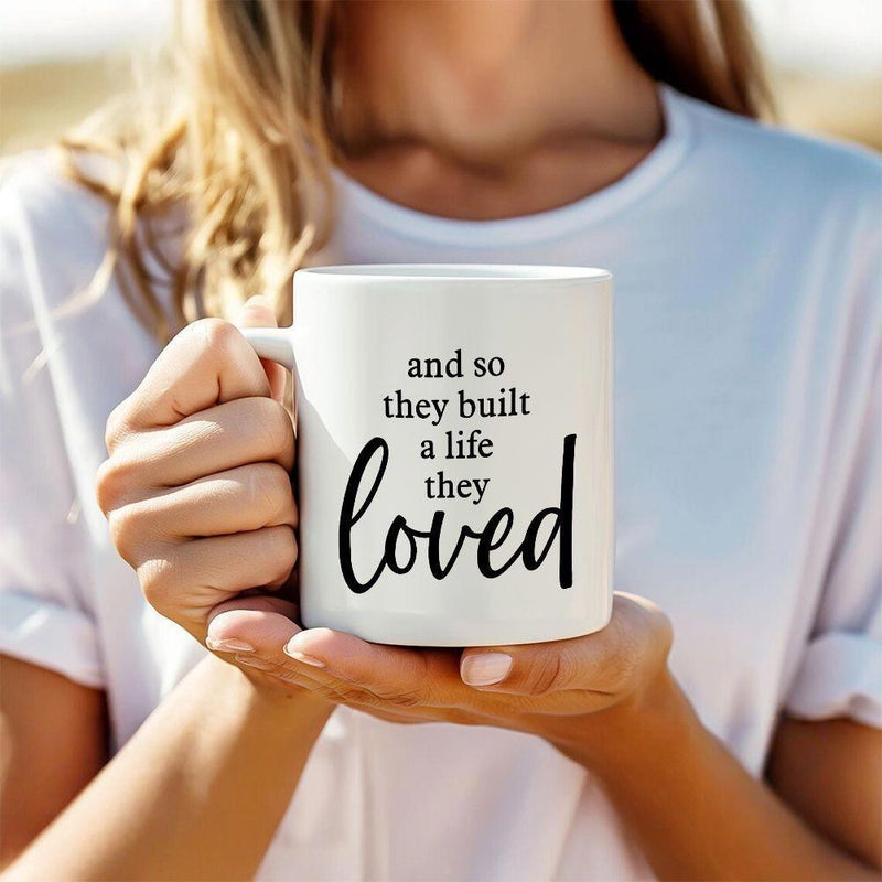 Tailorly White Ceramic 11 oz Mug - And So They Built A Life They Loved Pure With Elegant Black Script And Serif Lettering Mug