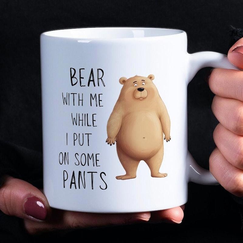 Tailorly White Ceramic 11 oz Mug - Bear With Me While I Put On Some Pants Standing Chubby Brown Cartoon Animal Among White Minimalist Background Bear