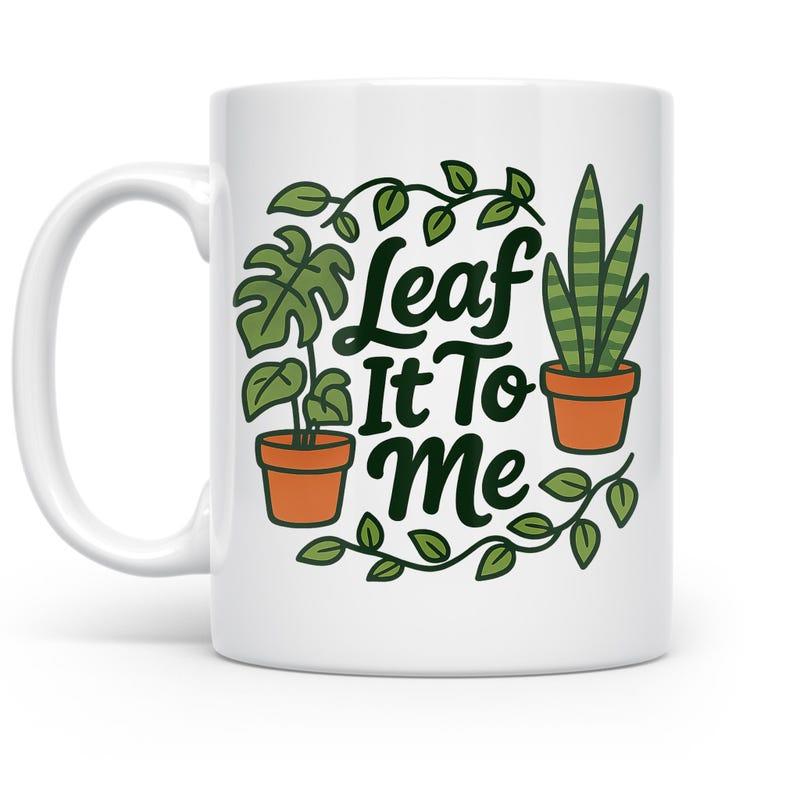 Tailorly White Ceramic 11 oz Mug - Leaf It To Me Green Potted Monstera And Snake Plant Among Decorative Hanging Vines Plant