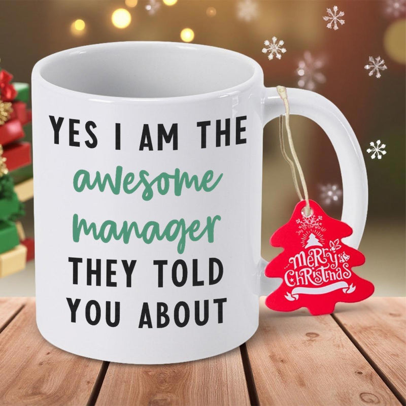 Tailorly White Ceramic 11 oz Mug - Yes I Am The Awesome Manager They Told You About Merry Christmas Pure White Ceramic Vessel Placed On Rustic Wooden Surface With