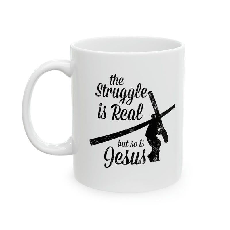 Tailorly White Ceramic 11 oz Mug - The Struggle Is Real But So Is Jesus Vintage Distressed Silhouette Carrying A Heavy Symbolic Wooden Religious Cross