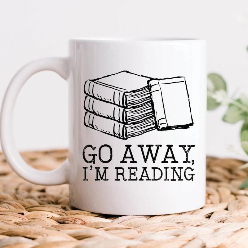 Tailorly White Ceramic 11 oz Mug - Go Away I'm Reading Hand Drawn Minimalist Black Line Art Stack Of Scholarly Vintage Books