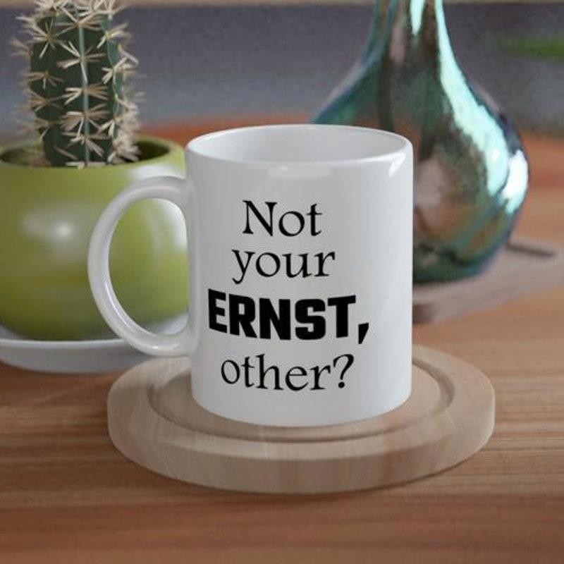 Tailorly White Ceramic 11 oz Mug - Not Your Ernst Other Minimalist White Ceramic Coffee Cup Sitting On A Round Wooden Coaster Mug