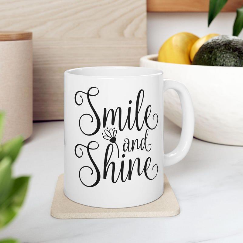 Tailorly White Ceramic 11 oz Mug - Smile And Shine Simple Hand Drawn Floral Illustration With Elegant Curving Script Calligraphy Lettering Mug