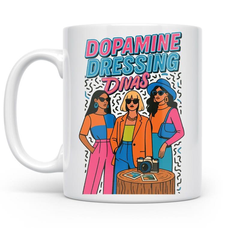 Tailorly White Ceramic 11 oz Mug - Dopamine Dressing Divas Three Stylish Women Wearing Vibrant Colorful Retro Fashion Outfits Portrait