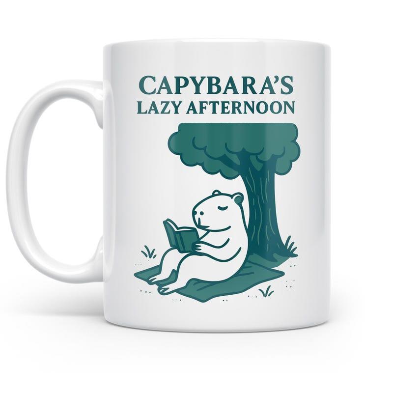 Tailorly White Ceramic 11 oz Mug - Capybara Lazy Afternoon Serene Animal Reading A Book Resting Under A Shady Tree Capybara