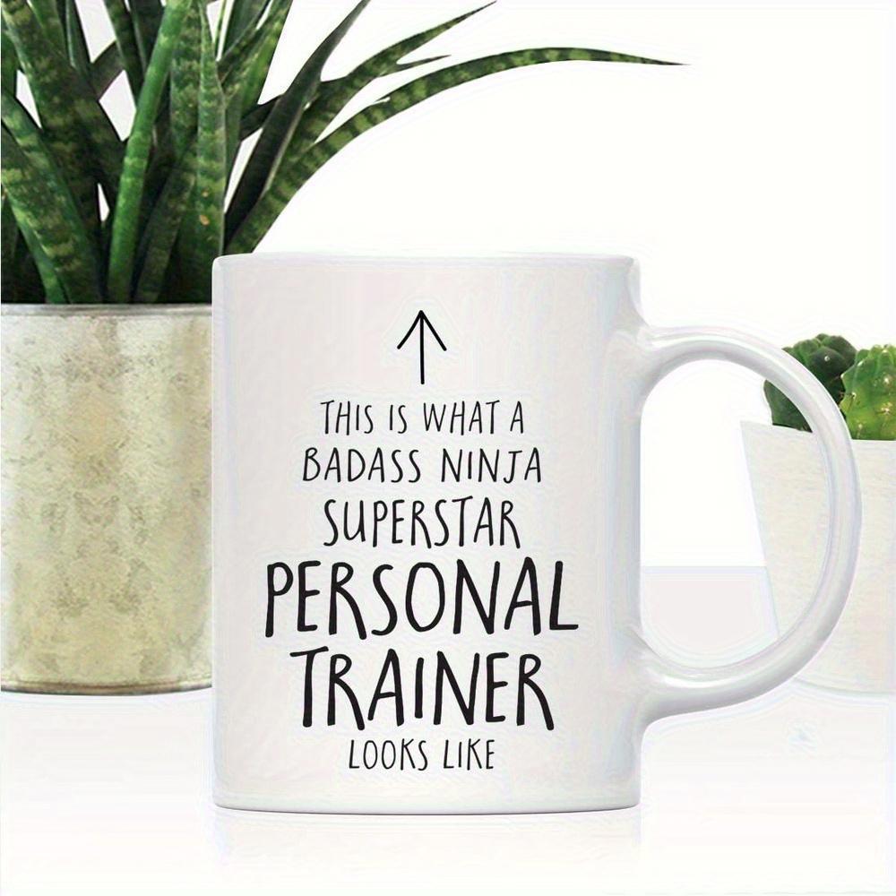 Tailorly White Ceramic 11 oz Mug - This Is What A Badass Ninja Superstar Personal Trainer Looks Like Minimalist Linear Symbol Pointing Upwards Toward The Ceiling