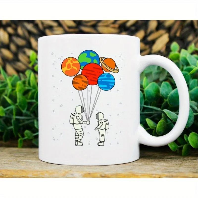 Tailorly White Ceramic 11 oz Mug - Minimalist Figures Holding Several Colorful Planet Balloons Amidst Distant Twinkling Stars Astronaut