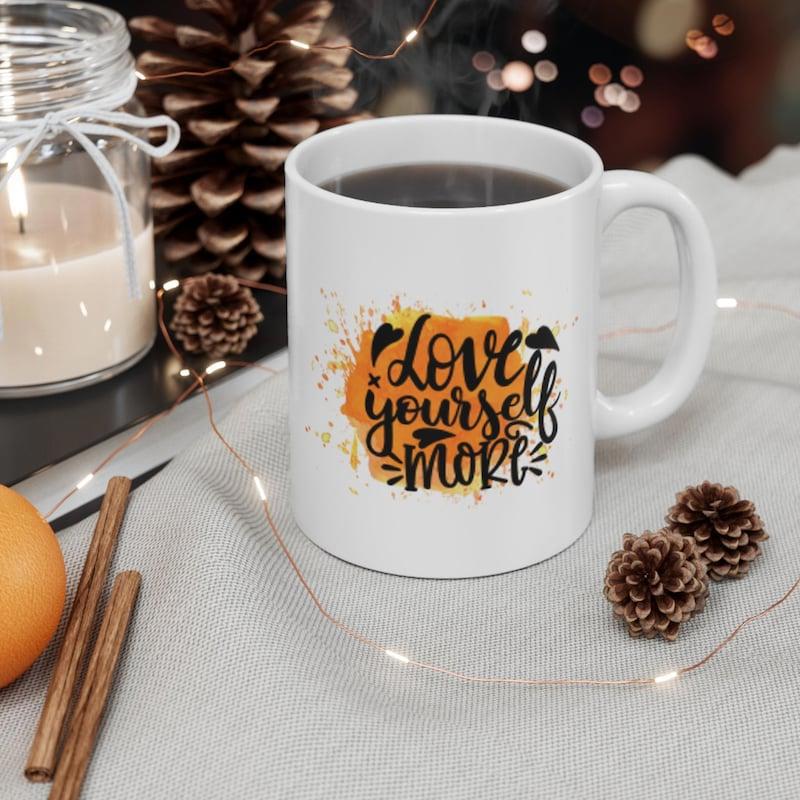 Tailorly White Ceramic 11 oz Mug - Love Yourself More Inspirational Quote Set Against Artistic Yellow Watercolor Splash With Small Mushroom Mug