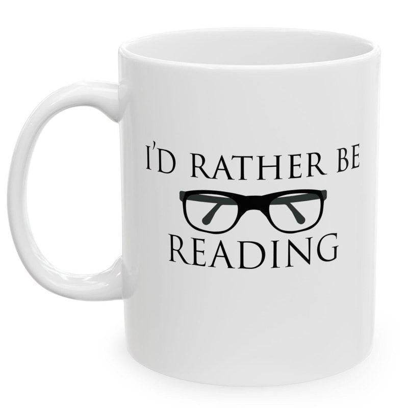 Tailorly White Ceramic 11 oz Mug - Id Rather Be Reading Classic Black Framed Eyeglasses Positioned Centrally Among Simple Literacy Focused Text Eyeglasses