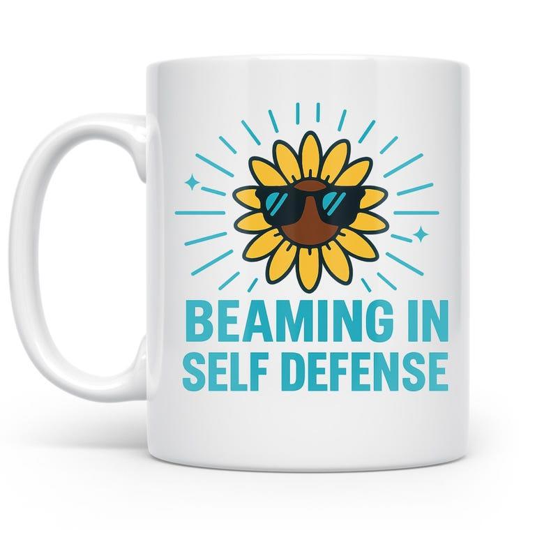 Tailorly White Ceramic 11 oz Mug - Beaming In Self Defense Bright Yellow Sunflower Wearing Sunglasses Radiating Blue Beams And Sparkling Elements Sunflower